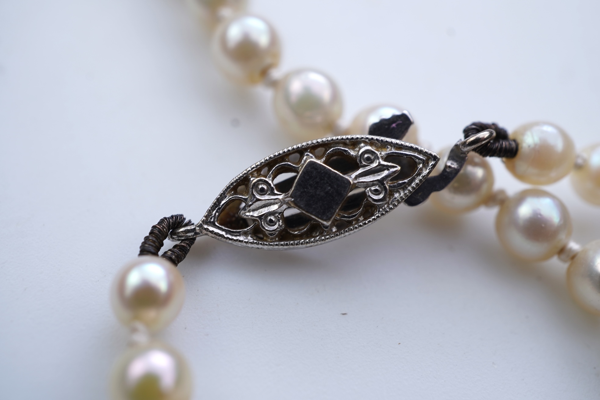 A cultured pearl and diamond necklace, early 20th century